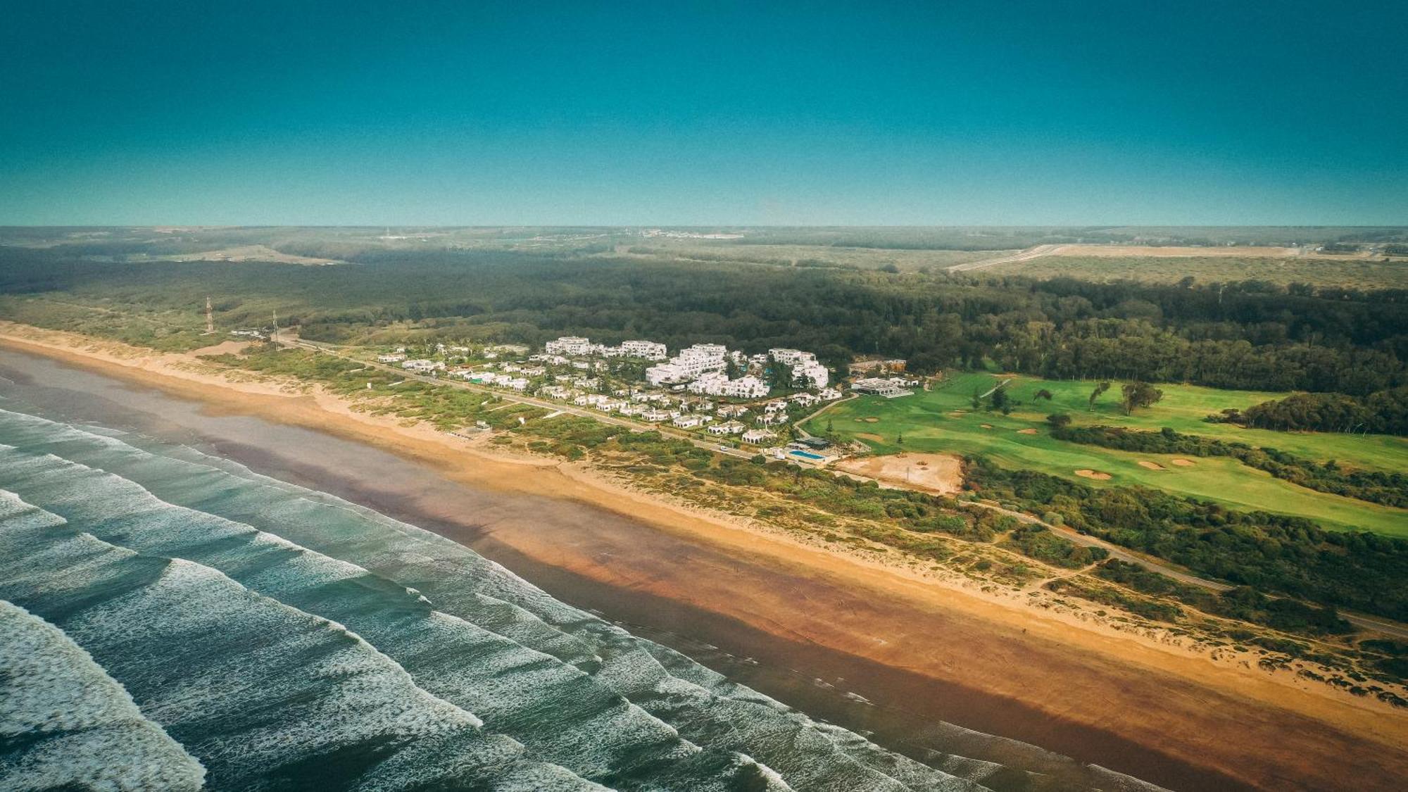 풀만 마자간 로얄 골프 앤 스파 호텔 엘자디다 외부 사진 Aerial view of the resort